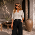 BLUSA CON CUELLO EN V Y BOTONES